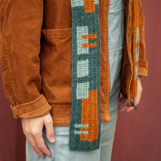 Rust & Rhythm - Szalik z kapturem
4