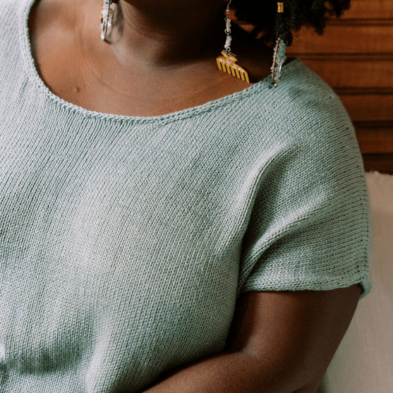 

Floreale Top - Koszulka z koronką z tyłu
8