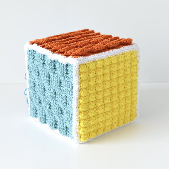 

Sensory Cube - Zabawka
3