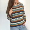 

Holiday Glow - Sweter
2